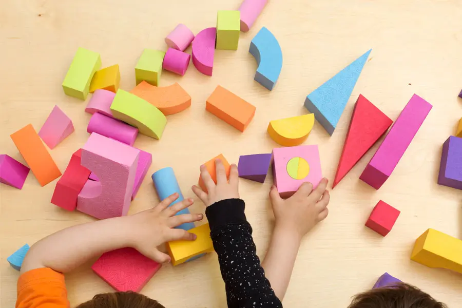 children-sharing-and-playing-with-toys